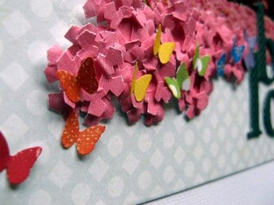 Layout detail - flowers made from punched snowflakes