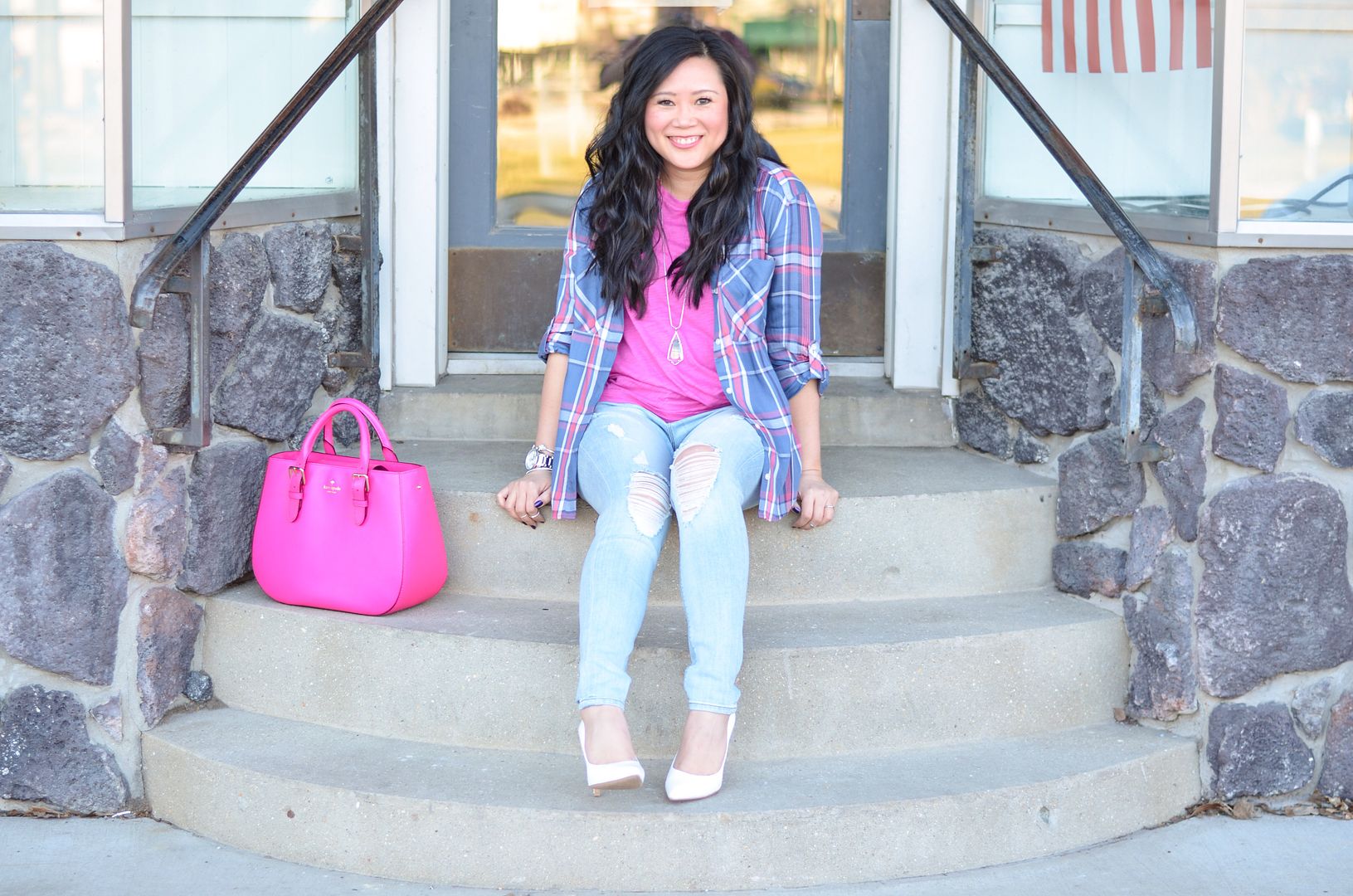 Plaid shirt worn over a tee with destroyed jeans and white pumps