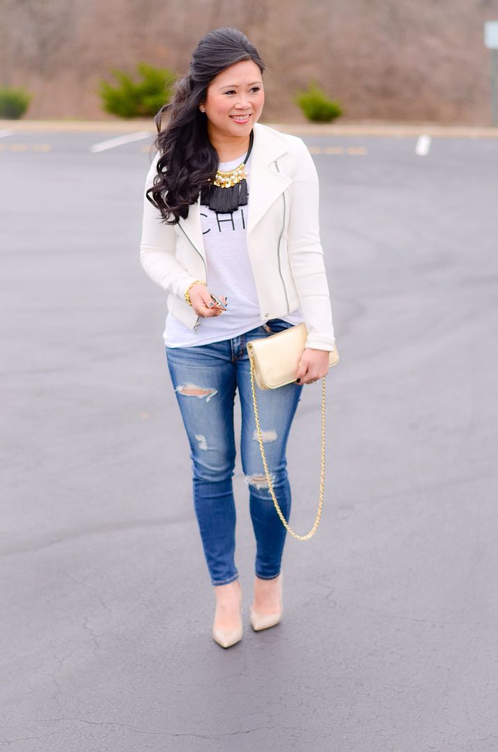 destroyed jeans and bold metallic accessories