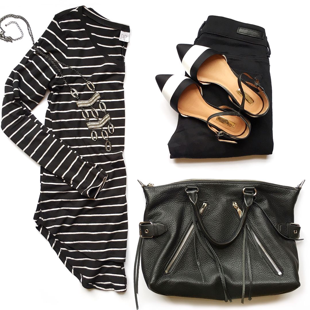 Black tee with white pinstripes, black skinnies, black and white striped flats