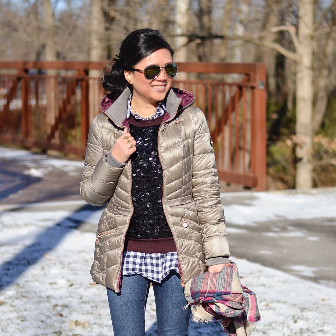 Bernardo packable coat, gingham button up and sequin sweater, Sorel Boots outfit