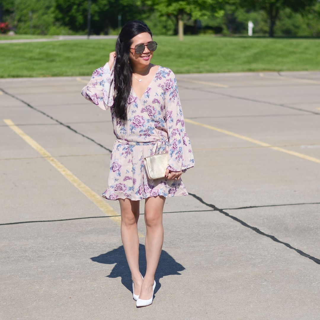 American Eagle floral romper and white pumps