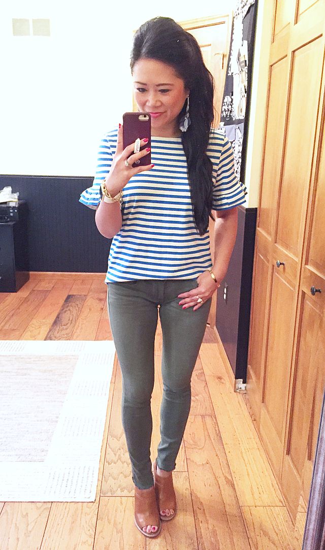 Blue and white striped top with olive pants outfit