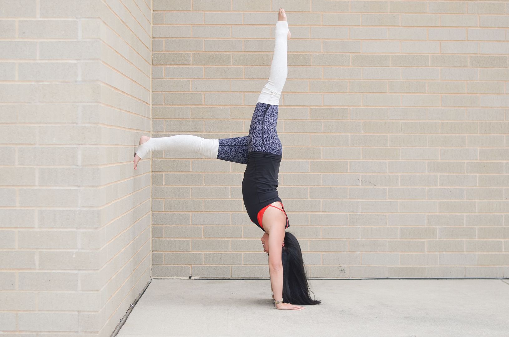 Handstand with wall assist