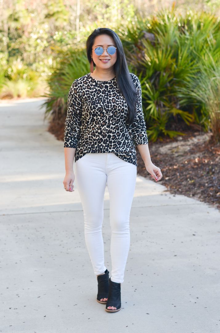 leopard sweater and white jeans