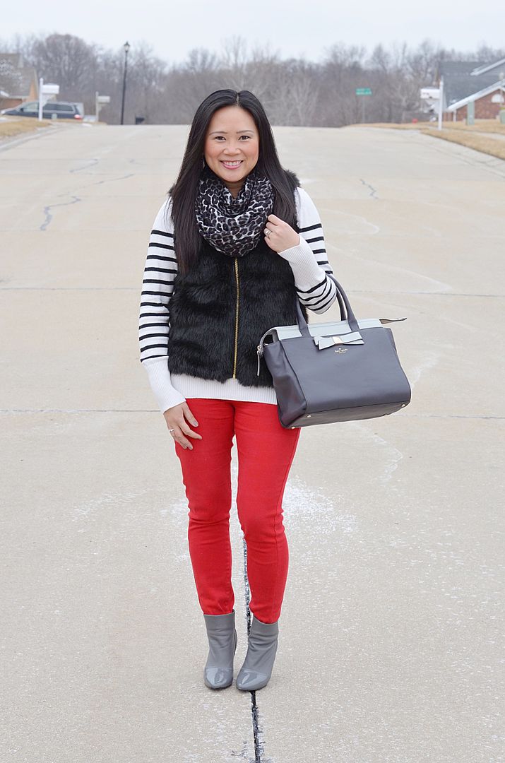 how to wear red, red bottoms, stripe sweater, black fur vest, grey booties