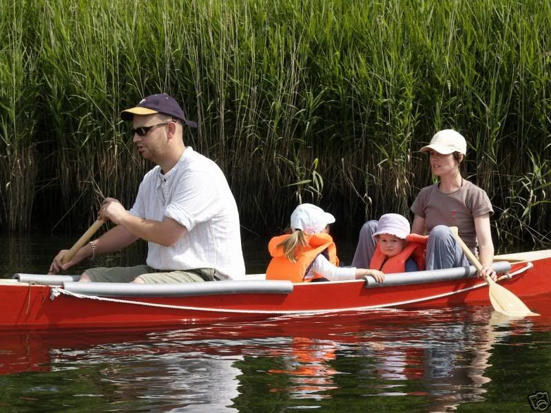 RedcanoesoldebayJuly2006with2adults.jpg