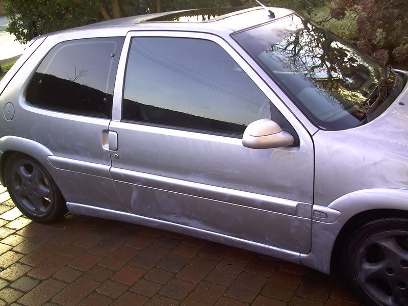 ive got a black on on my silver saxo. i got it done when i had tints all 