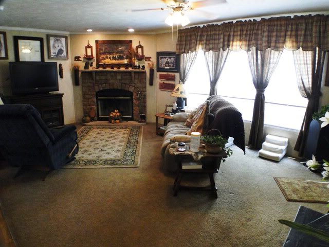 Woodburning rocked fireplace in the family room... there is also a separate formal living room, Franklin NC Manufactured, Franklin NC Mobile Homes