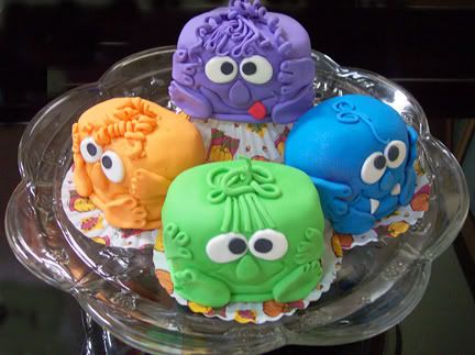 monster1.jpg Monster Halloween Jumbo Cupcakes Chocolate or White Cake, buttercream frosting and covered in fondant. image by alh99
